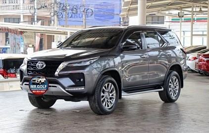 Toyota Fortuner SUV with driver, ideal for long journeys and road trips